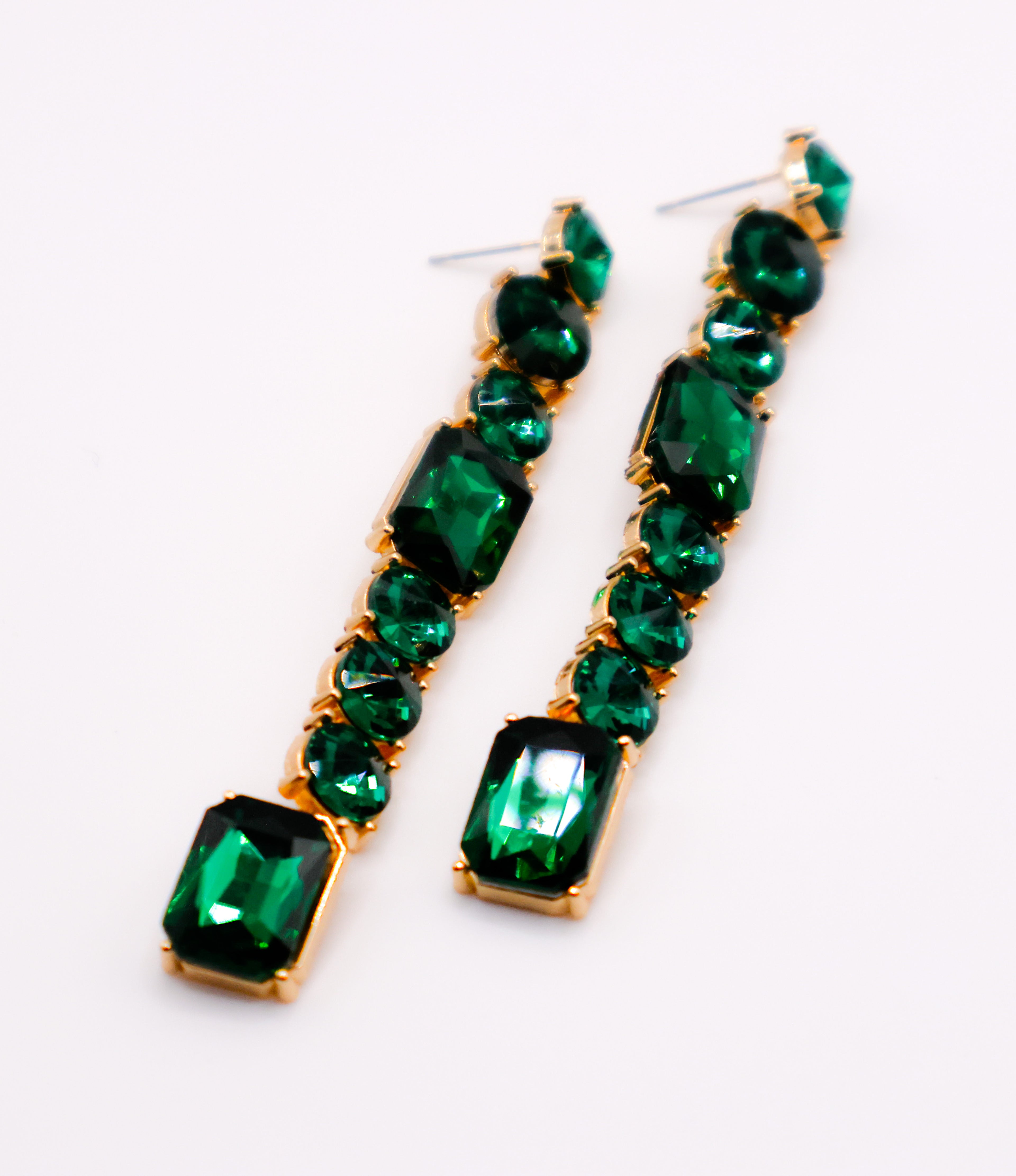 Le Réussi® Emerald Cascade Earrings – luxury green faux diamond statement earrings for women, elegant gemstone-inspired jewelry for special occasions.