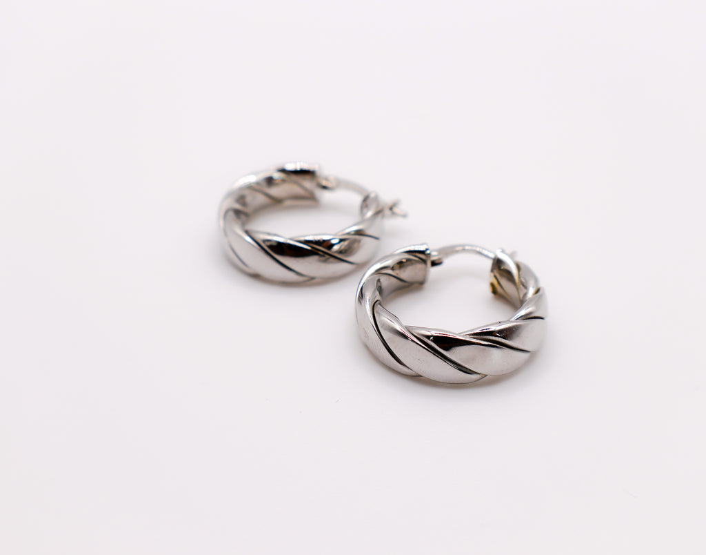 Elegant Italian twisted texture sterling silver hoop earrings for women.