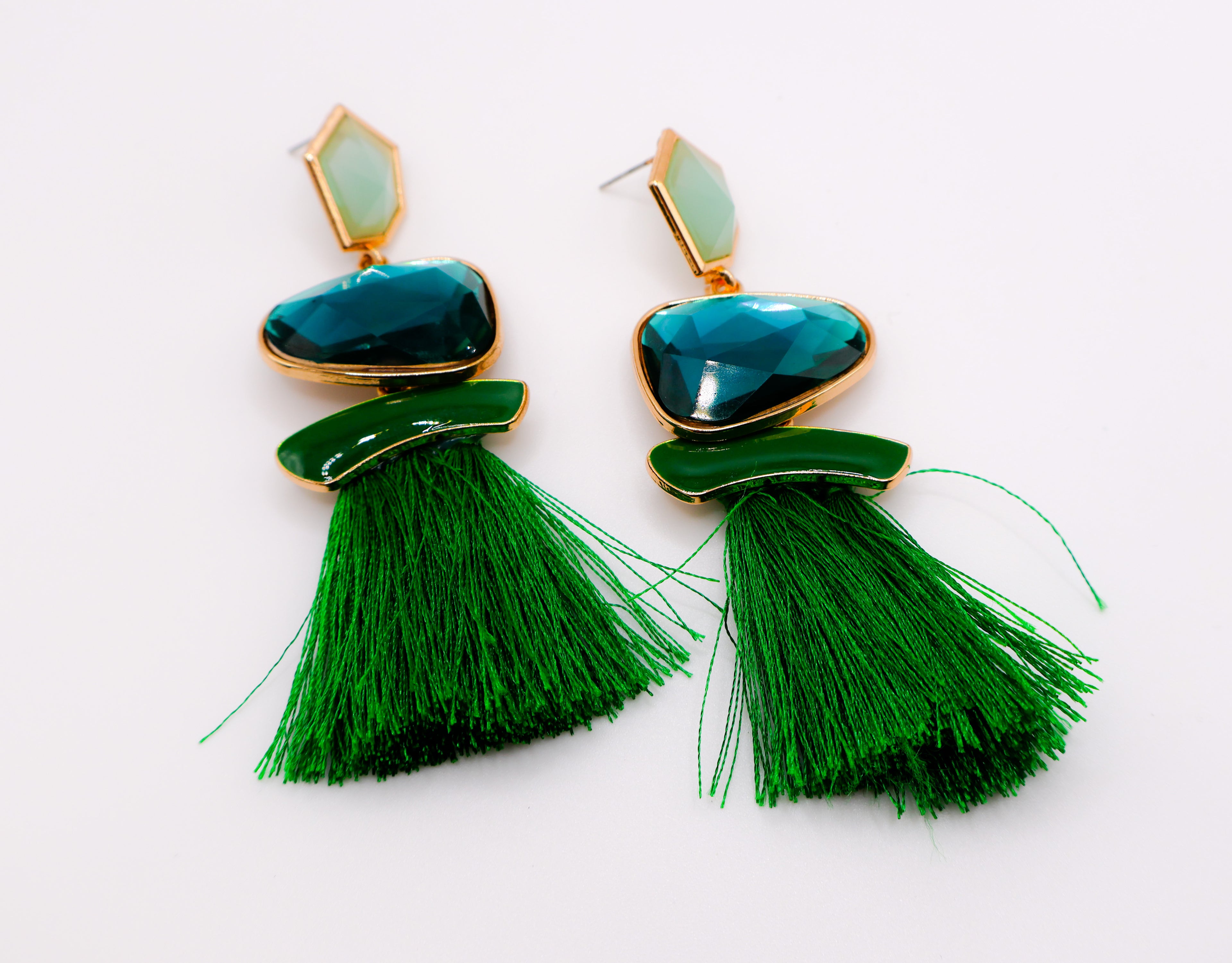 Le Réussi® elegant green faux diamond earrings with emerald-inspired gemstones and gold accents, luxury statement jewelry for women.