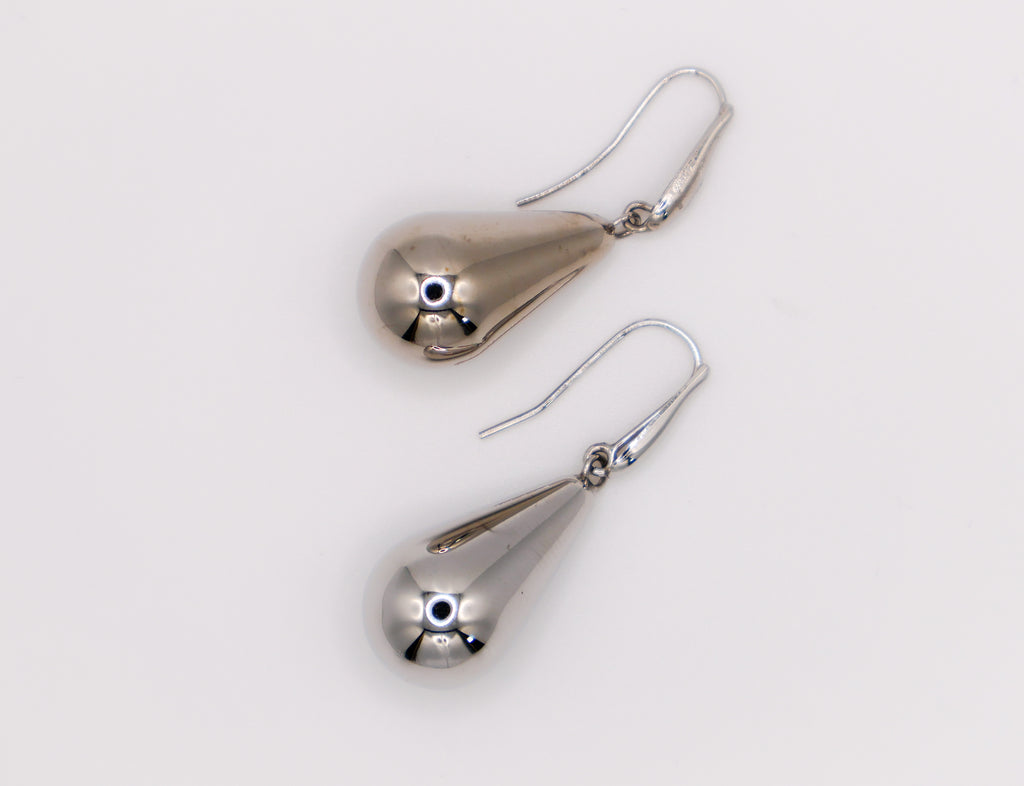 Sterling silver raindrop earrings with elegant dangling design for women.