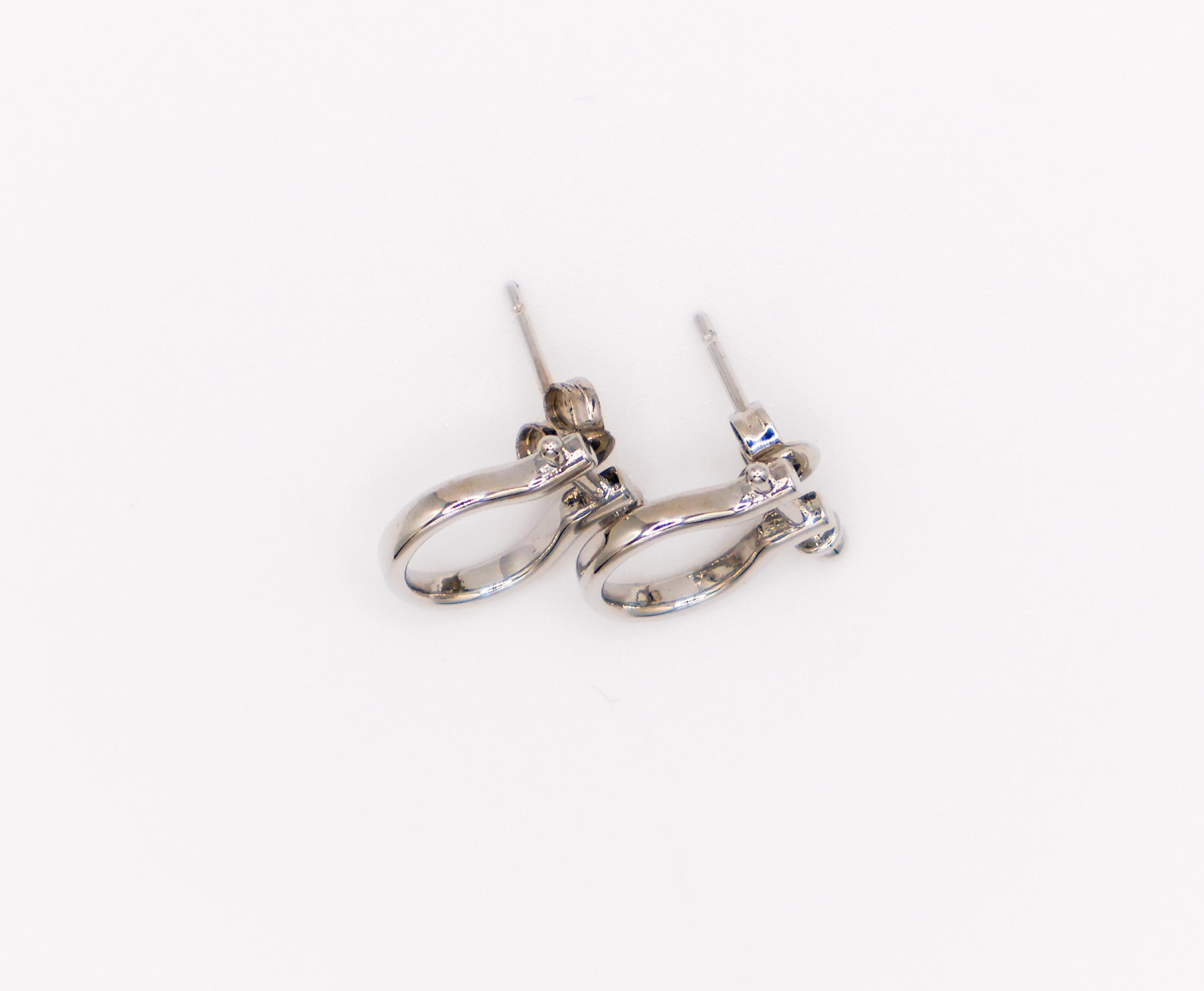 Whimsical white gold horseshoe earrings – elegant lucky charm jewelry for women, versatile casual and formal design