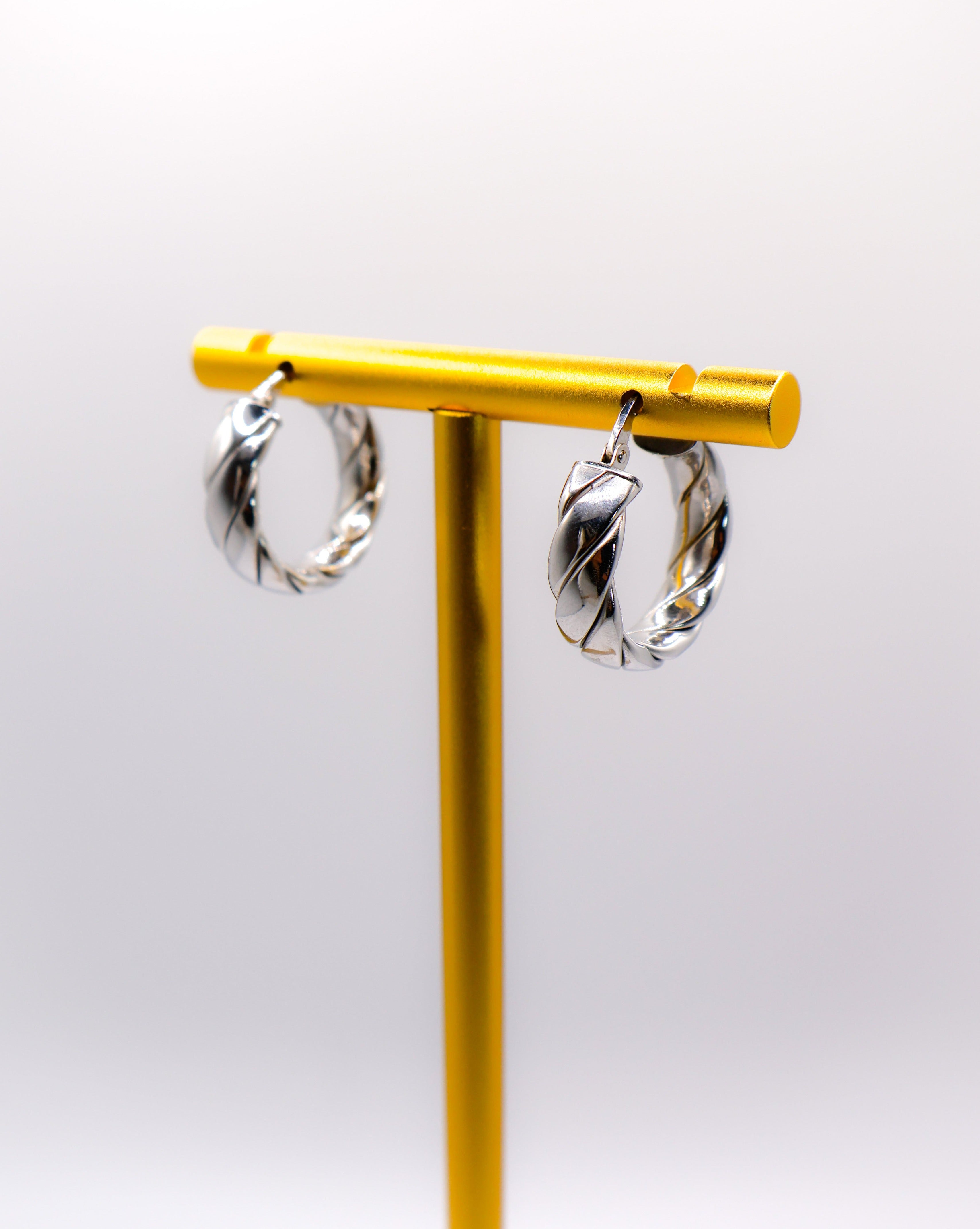 Elegant Italian twisted texture sterling silver hoop earrings for women.