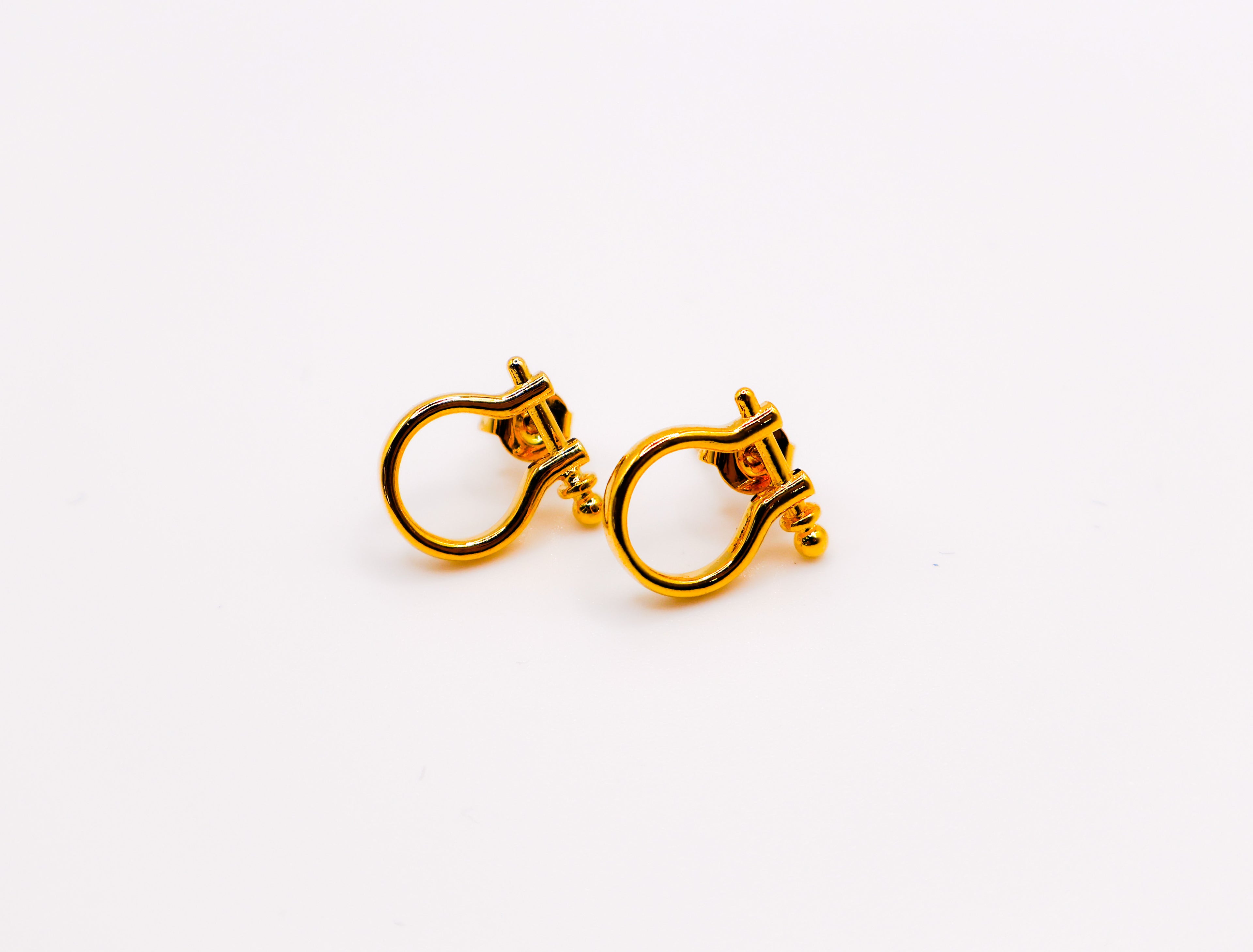 Golden Horseshoe Mini Earrings – gold-plated lucky charm earrings for women, delicate minimalist jewelry