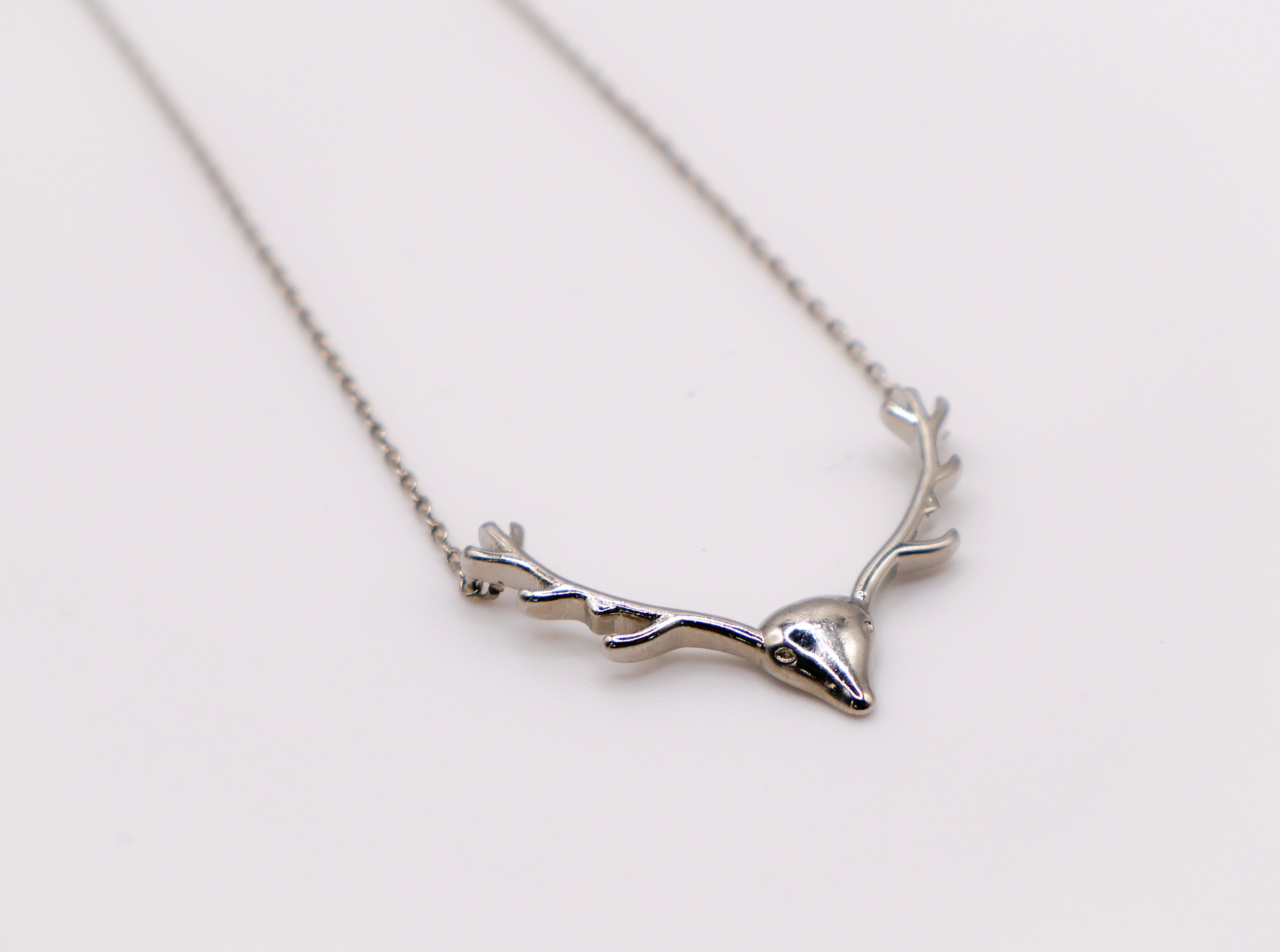 Le Réussi Enchanted Antler Charm Necklace with delicate gold antler pendant
