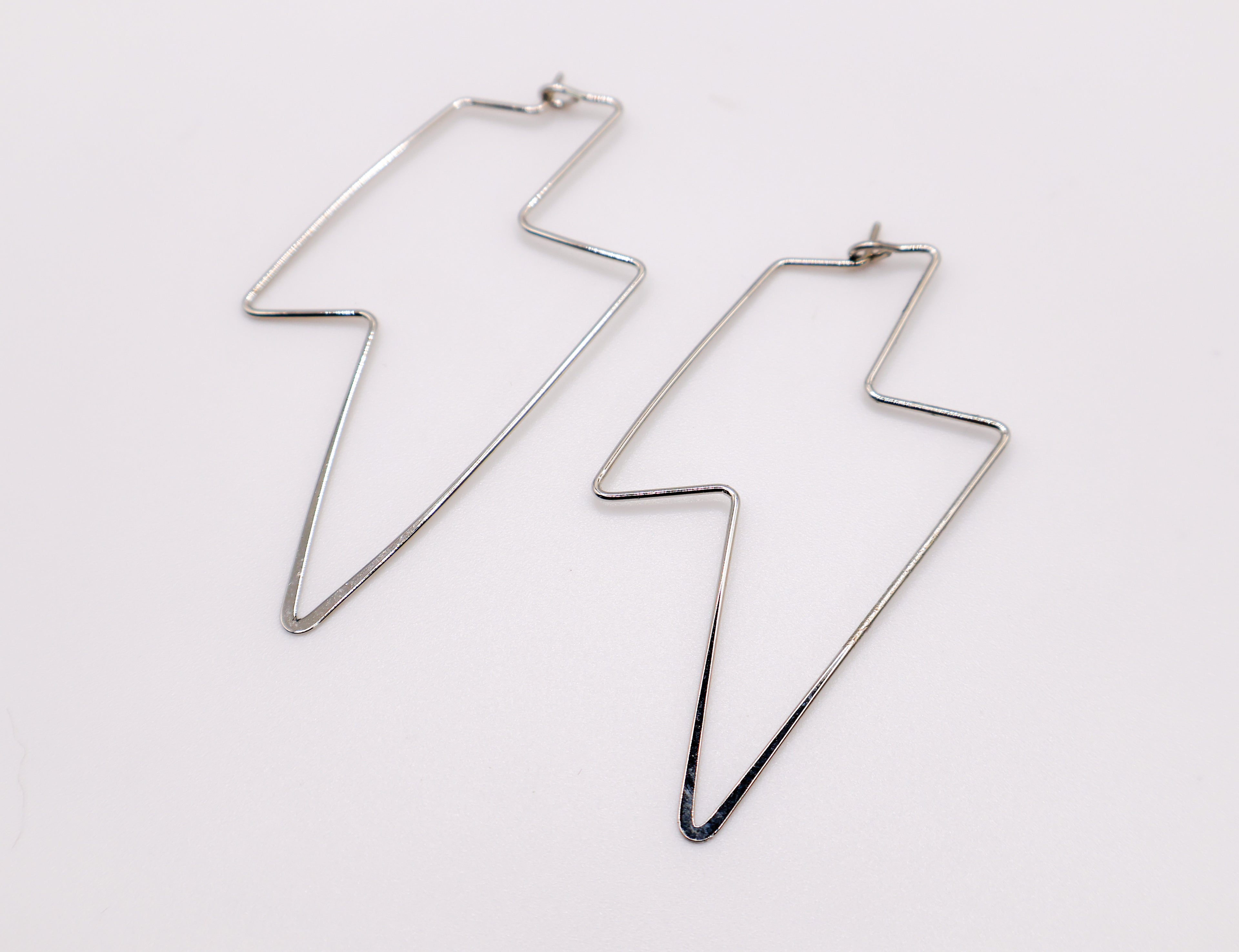 Rosy Luminary Round Earrings – elegant rose gold earrings for women, stylish statement jewelry