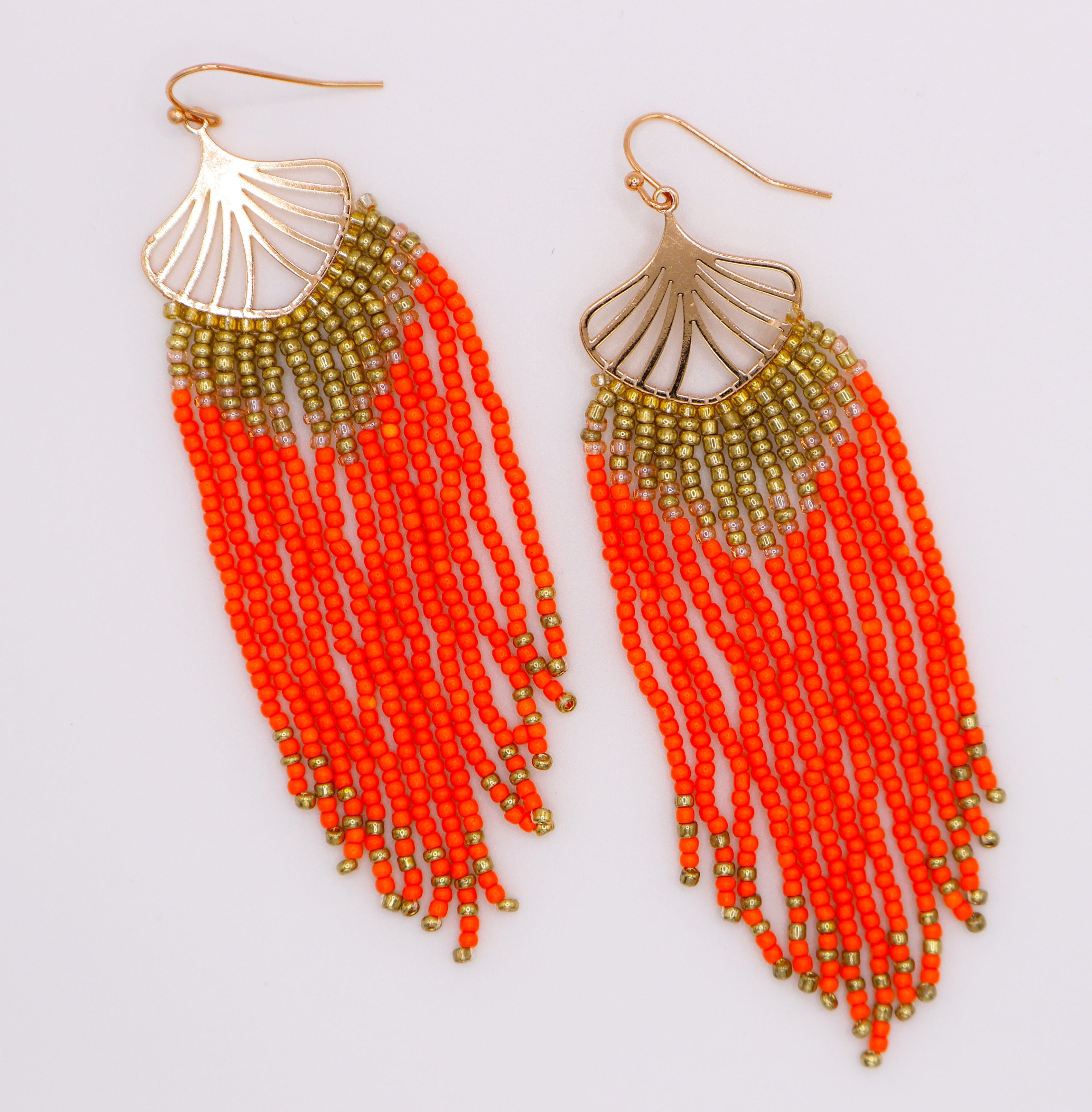Le Réussi® Golden Leaves Earrings – luxury gold leaf statement earrings with orange beads for women, elegant fashion jewelry for special occasions.