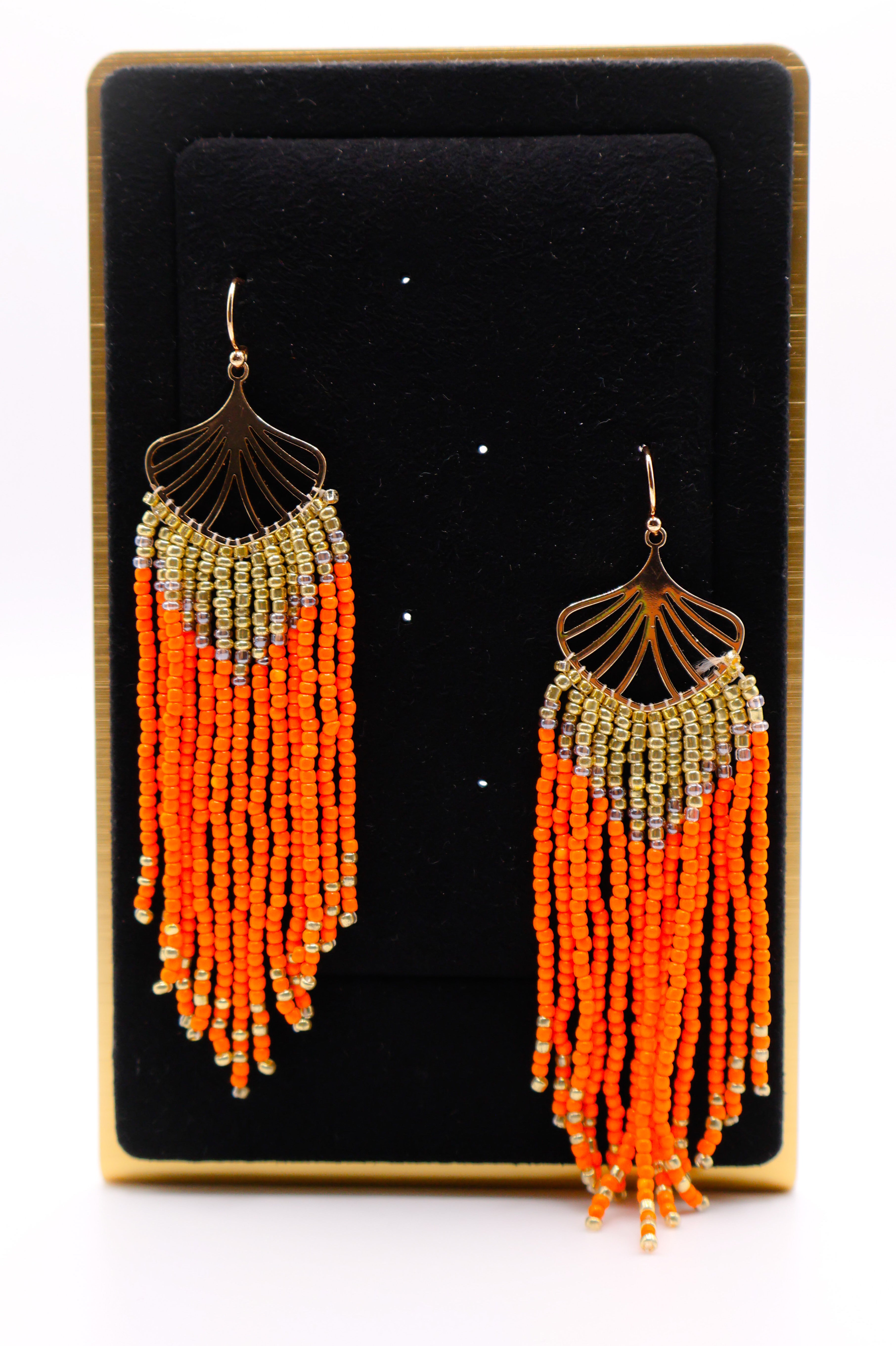 Le Réussi® Golden Leaves Earrings – luxury gold leaf statement earrings with orange beads for women, elegant fashion jewelry for special occasions.