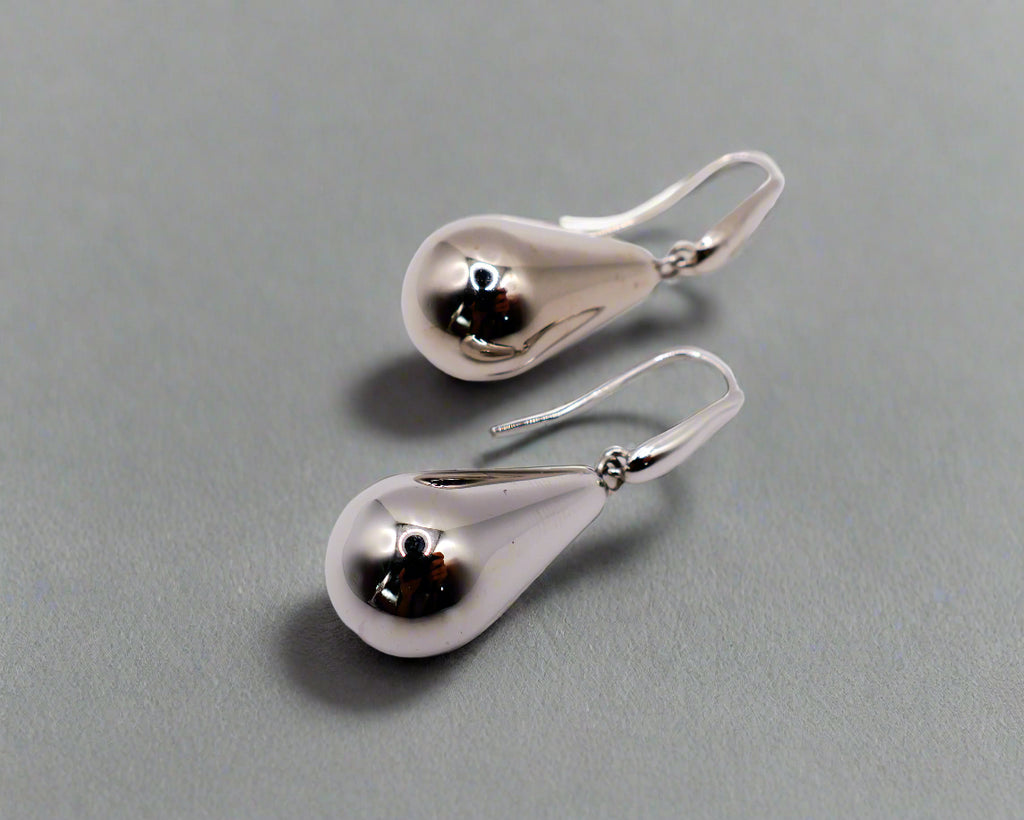 Sterling silver raindrop earrings with elegant dangling design for women.