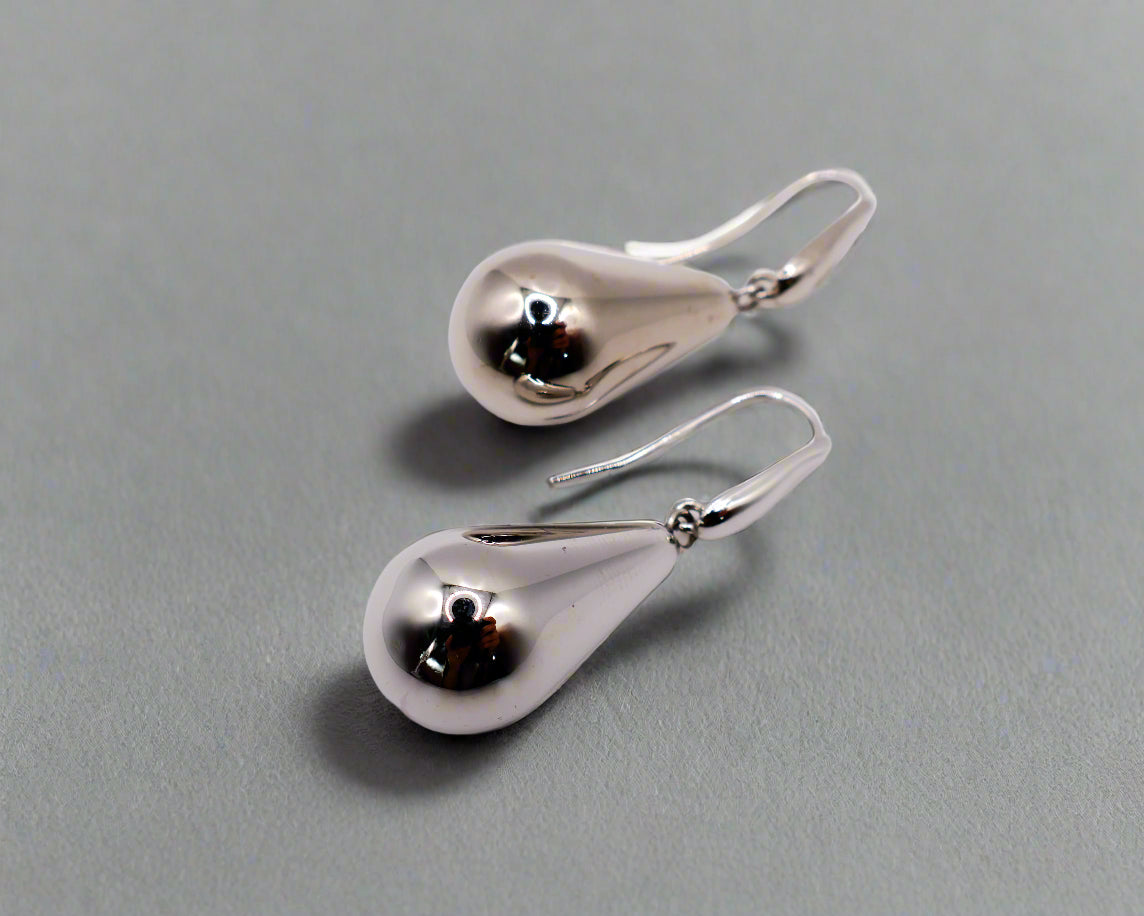 Sterling silver raindrop earrings with elegant dangling design for women.