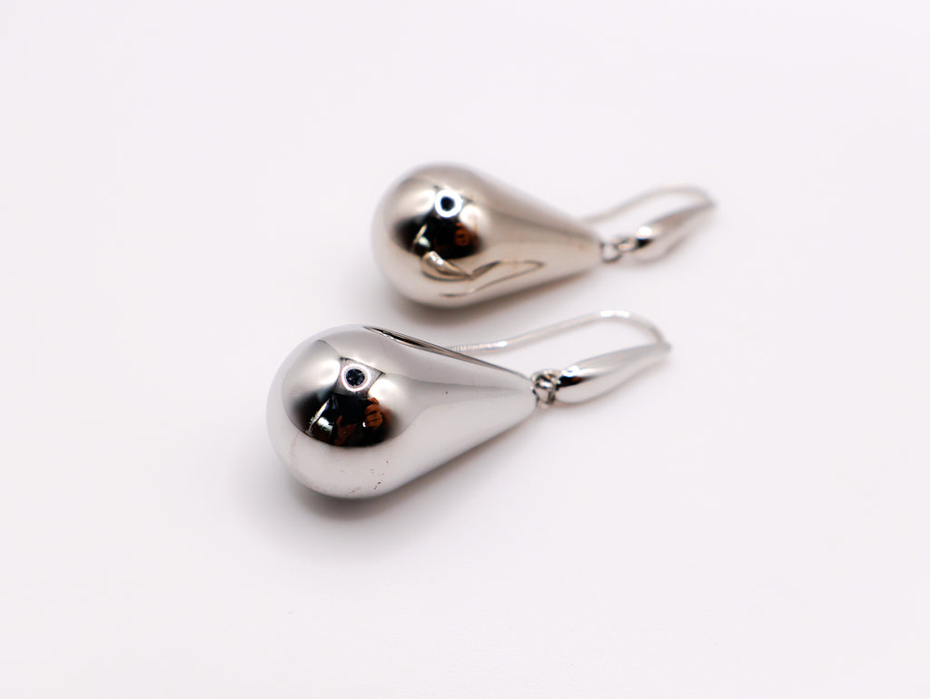 Sterling silver raindrop earrings with elegant dangling design for women.