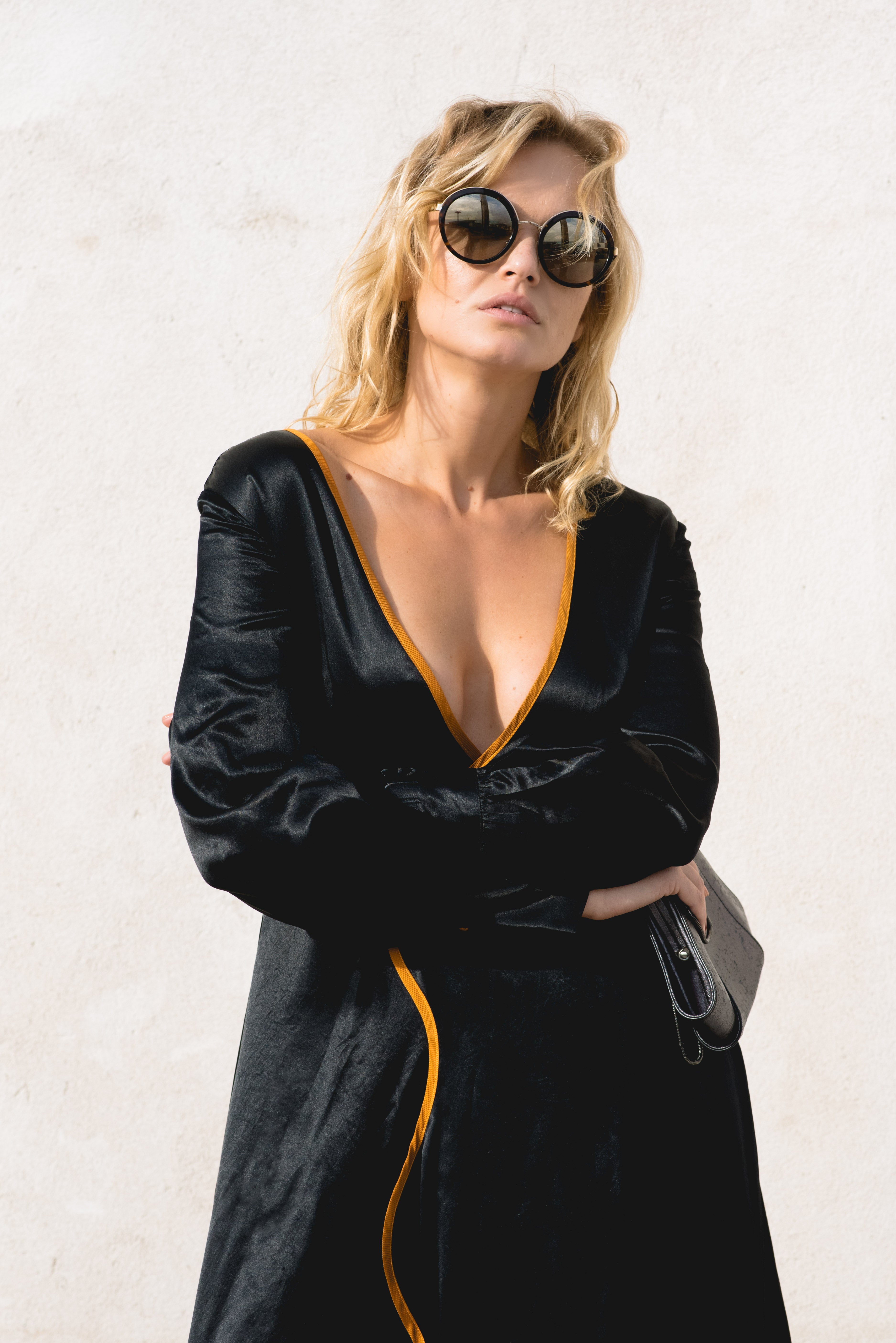 Le reussi Fashion-Adrienne Black Crafted from premium silk and adorned with elegant orange line details,this style dress features a sophisticated v-neck and long sleeves.