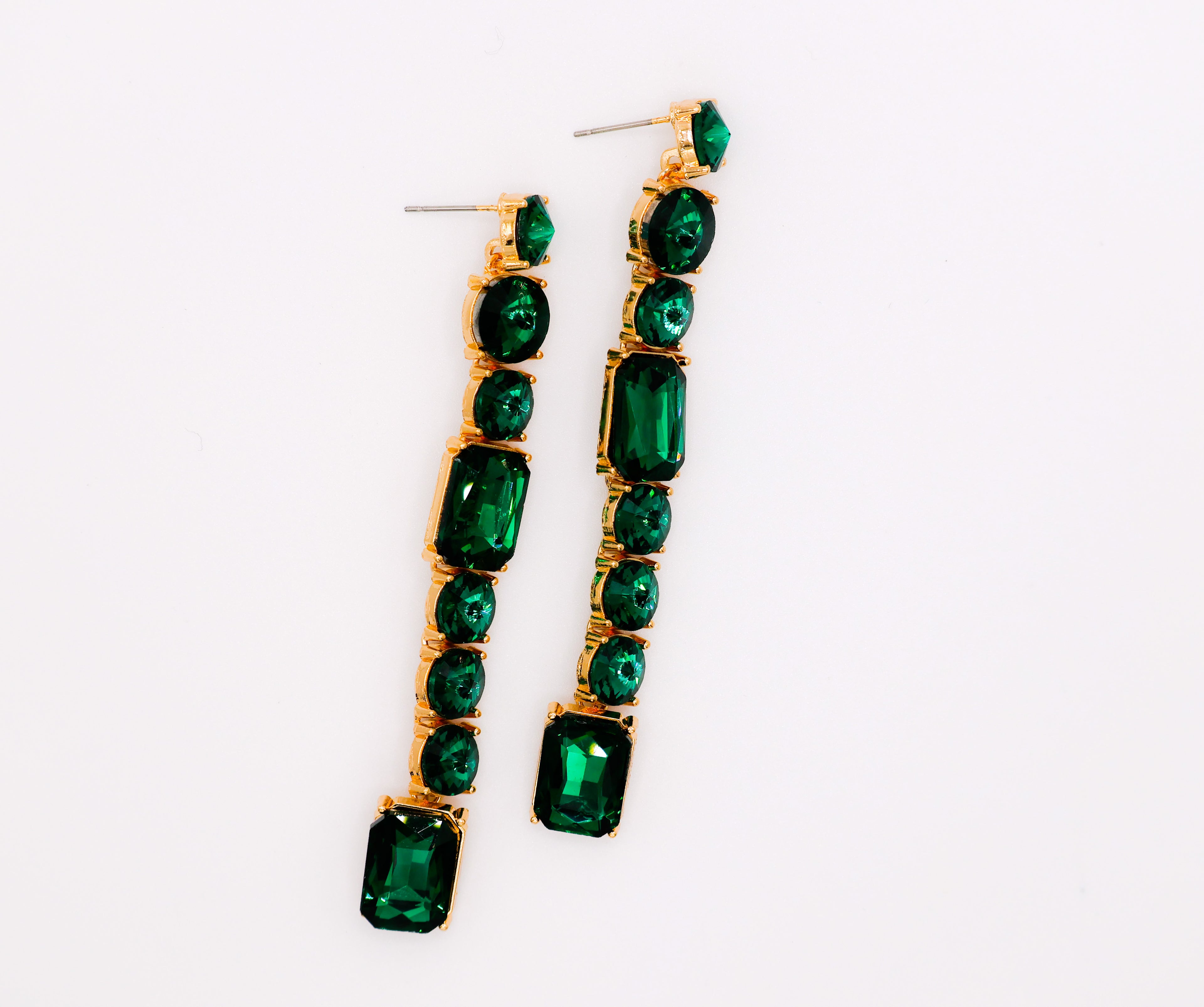 Le Réussi® Emerald Cascade Earrings – luxury green faux diamond statement earrings for women, elegant gemstone-inspired jewelry for special occasions.