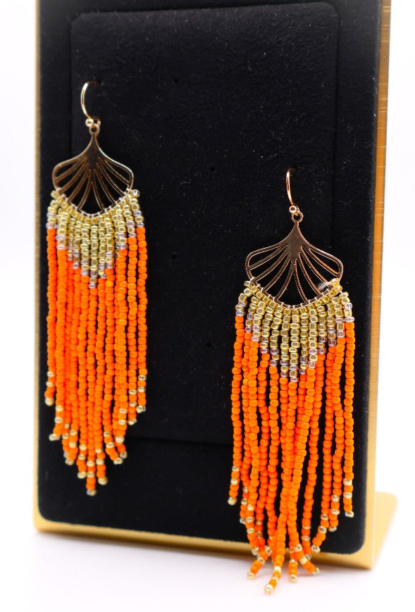 Le Réussi® Golden Leaves Earrings – luxury gold leaf statement earrings with orange beads for women, elegant fashion jewelry for special occasions.