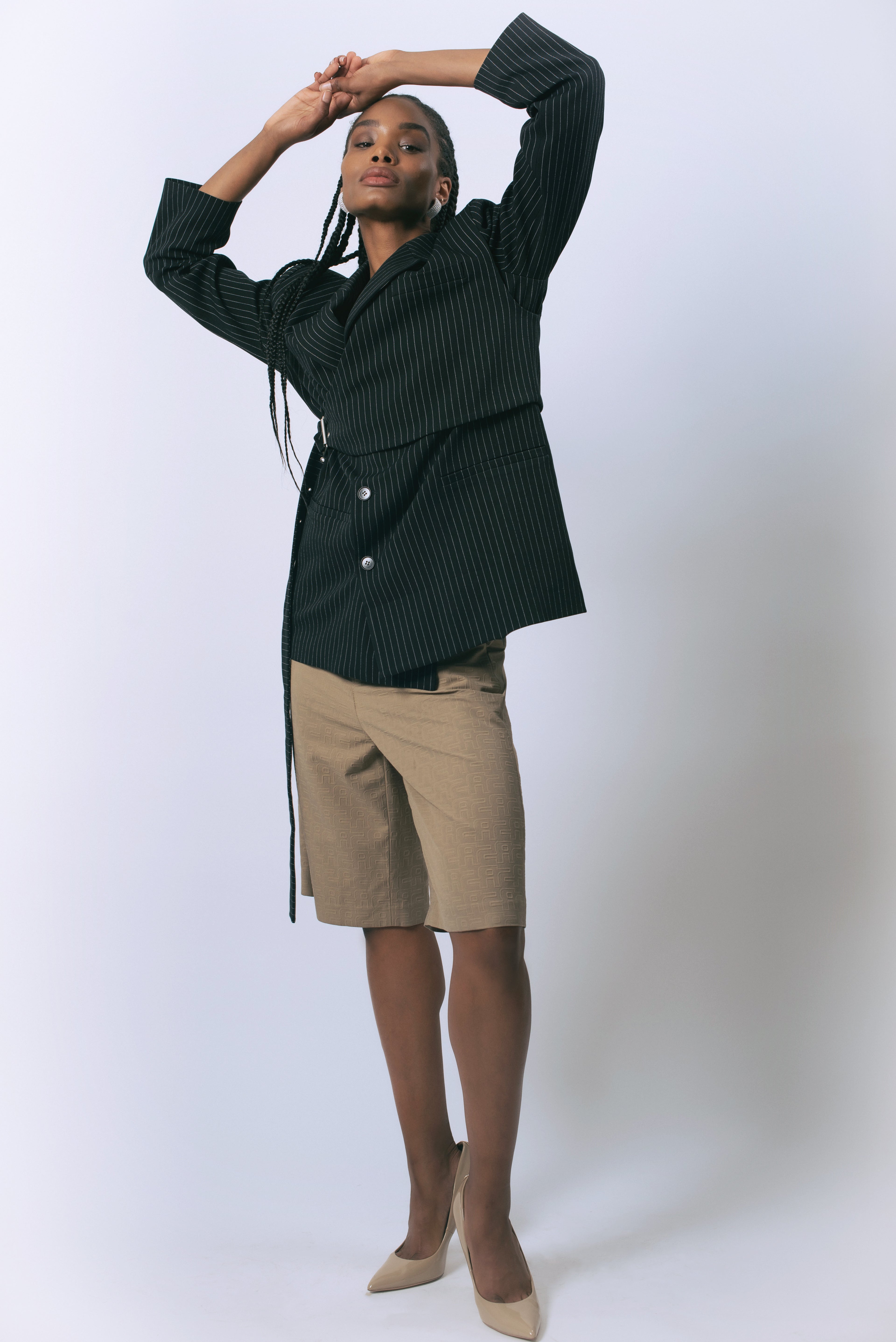 Le reussi Fashion-Luna Noir Pinstripe Blazer with a front button closure, this blazer is perfect for any sophisticated and exclusive occasion