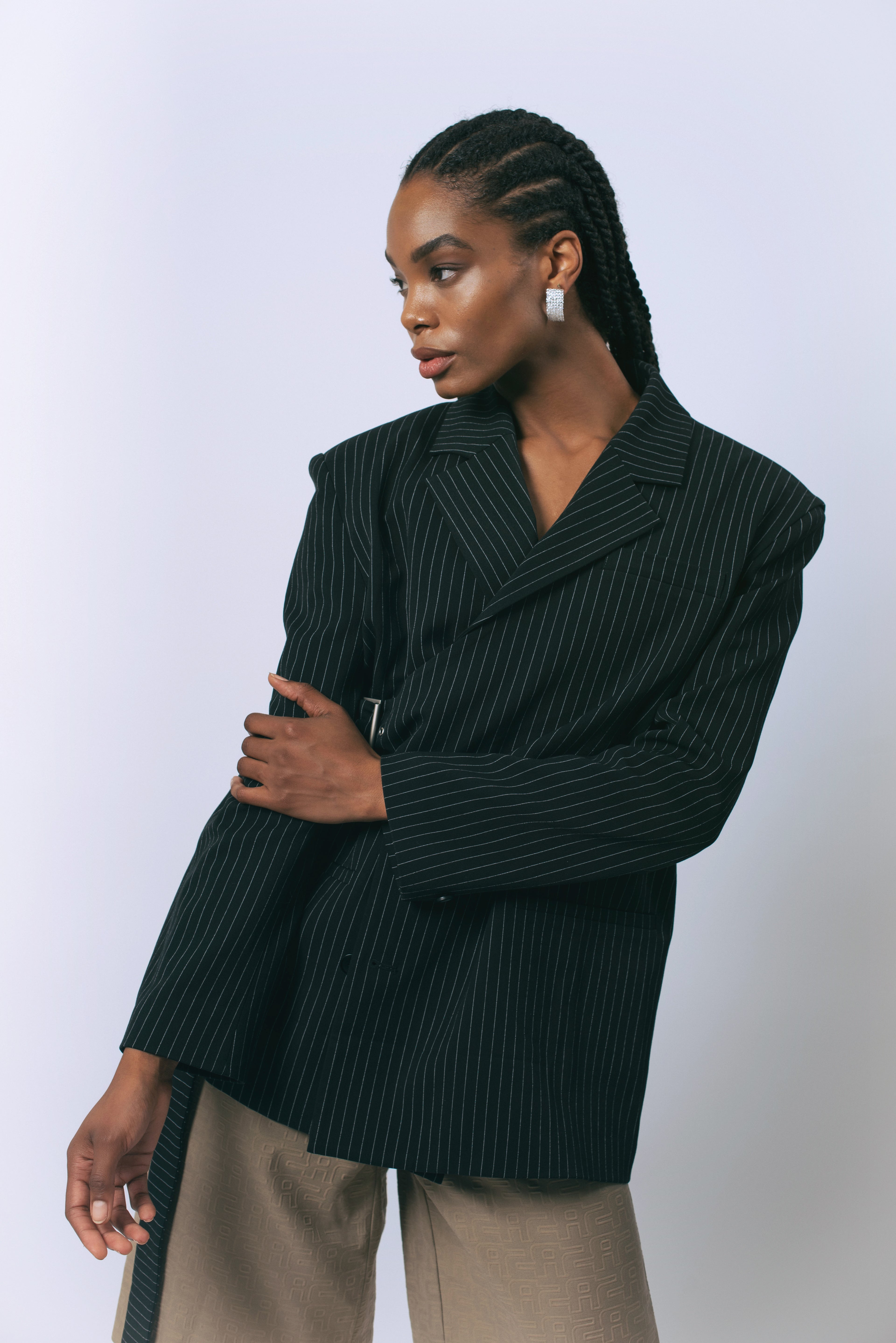 Le reussi Fashion-Luna Noir Pinstripe Blazer with a front button closure, this blazer is perfect for any sophisticated and exclusive occasion