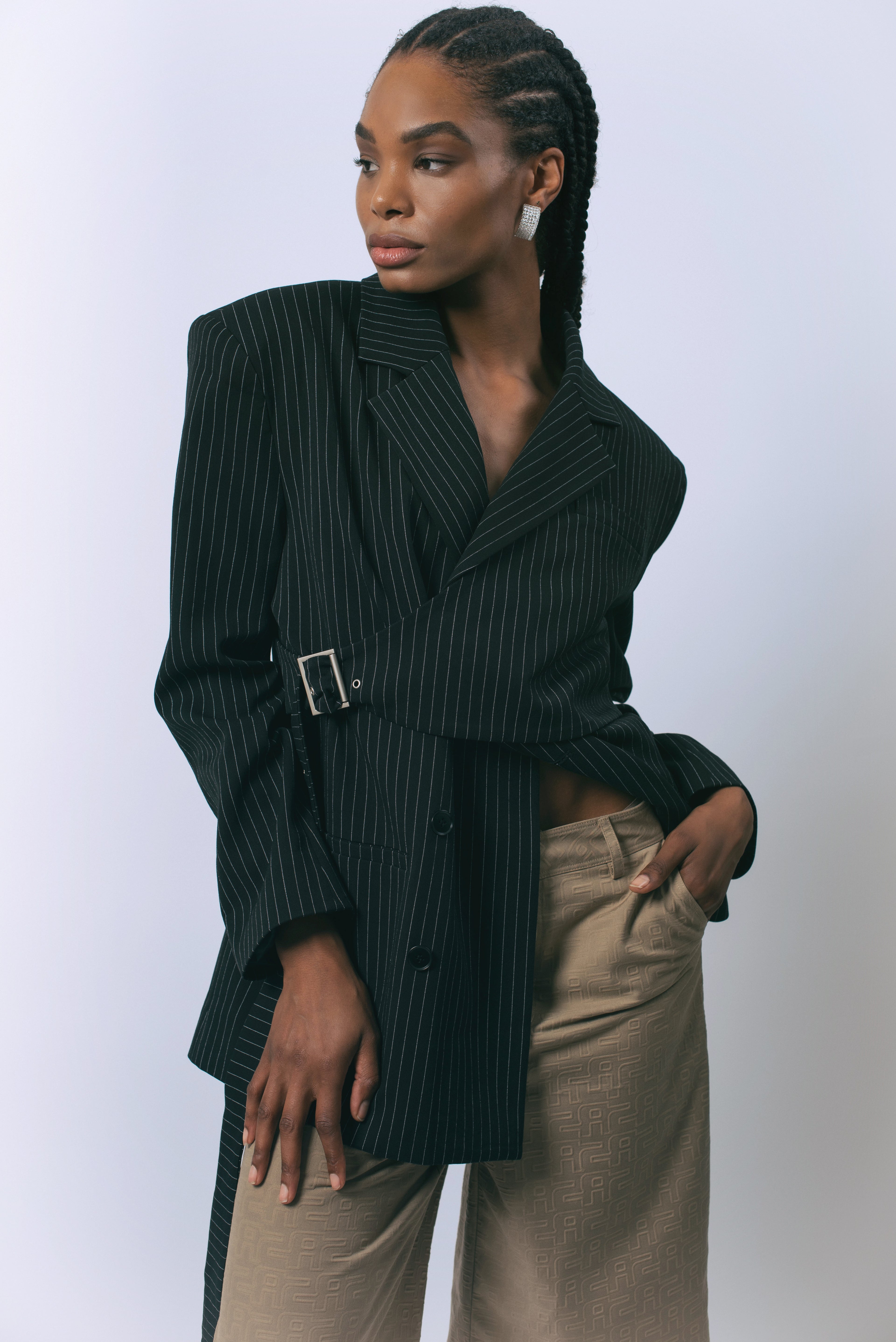 Le reussi Fashion-Luna Noir Pinstripe Blazer with a front button closure, this blazer is perfect for any sophisticated and exclusive occasion