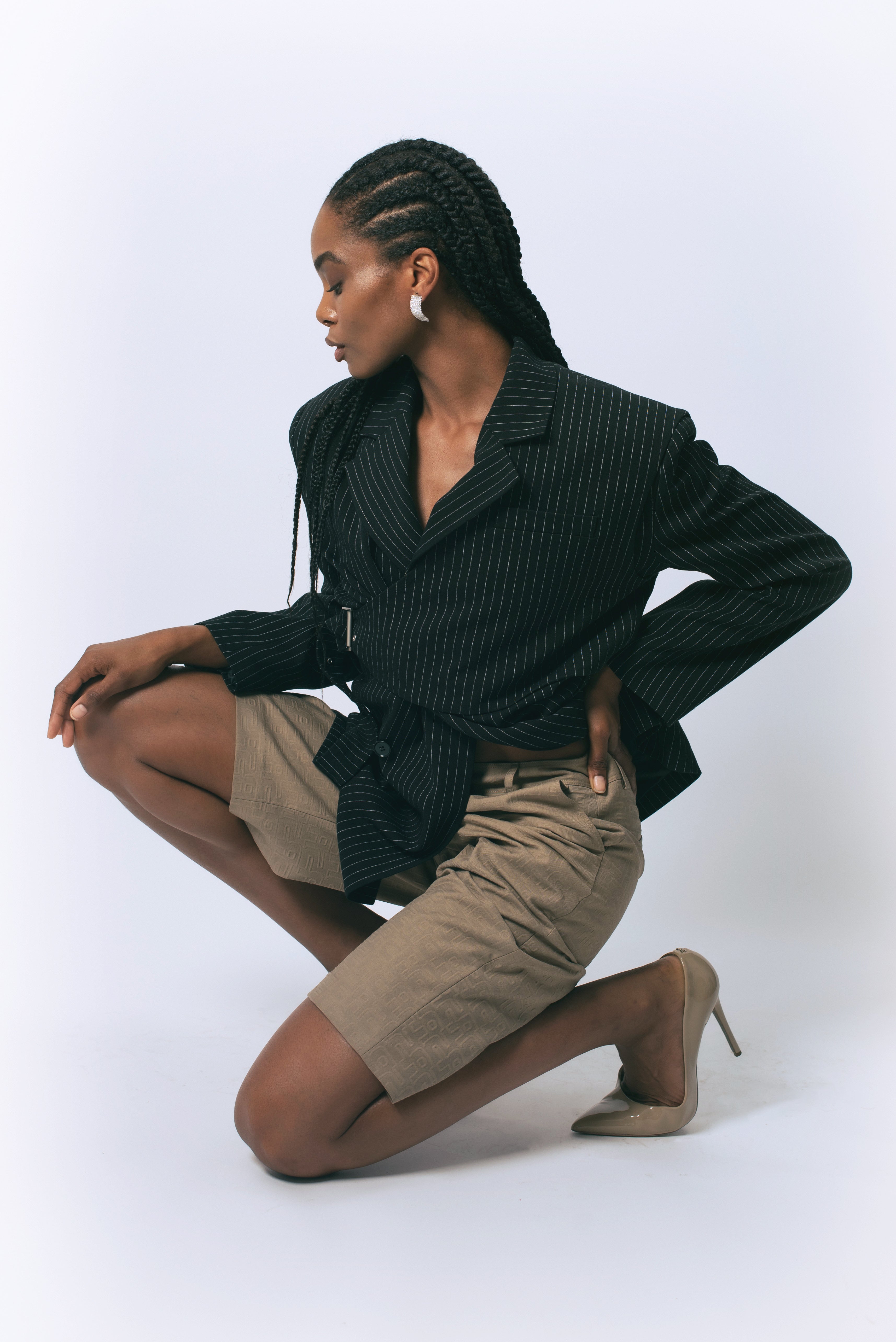 Le reussi Fashion-Luna Noir Pinstripe Blazer with a front button closure, this blazer is perfect for any sophisticated and exclusive occasion