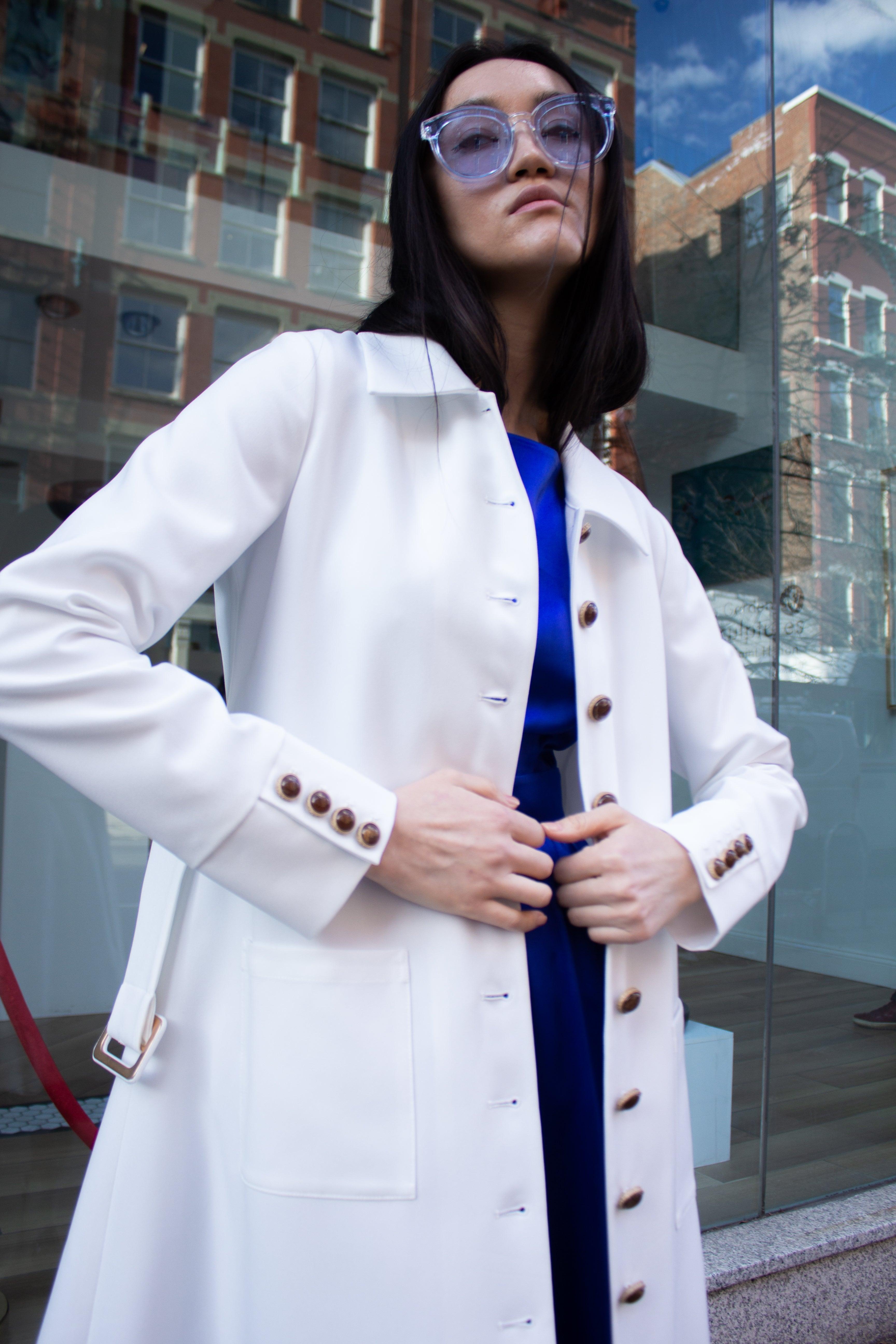 Le Réussi® Fashion - Monique White Coat an epitome of luxury and grace, tailored for timeless sophistication.