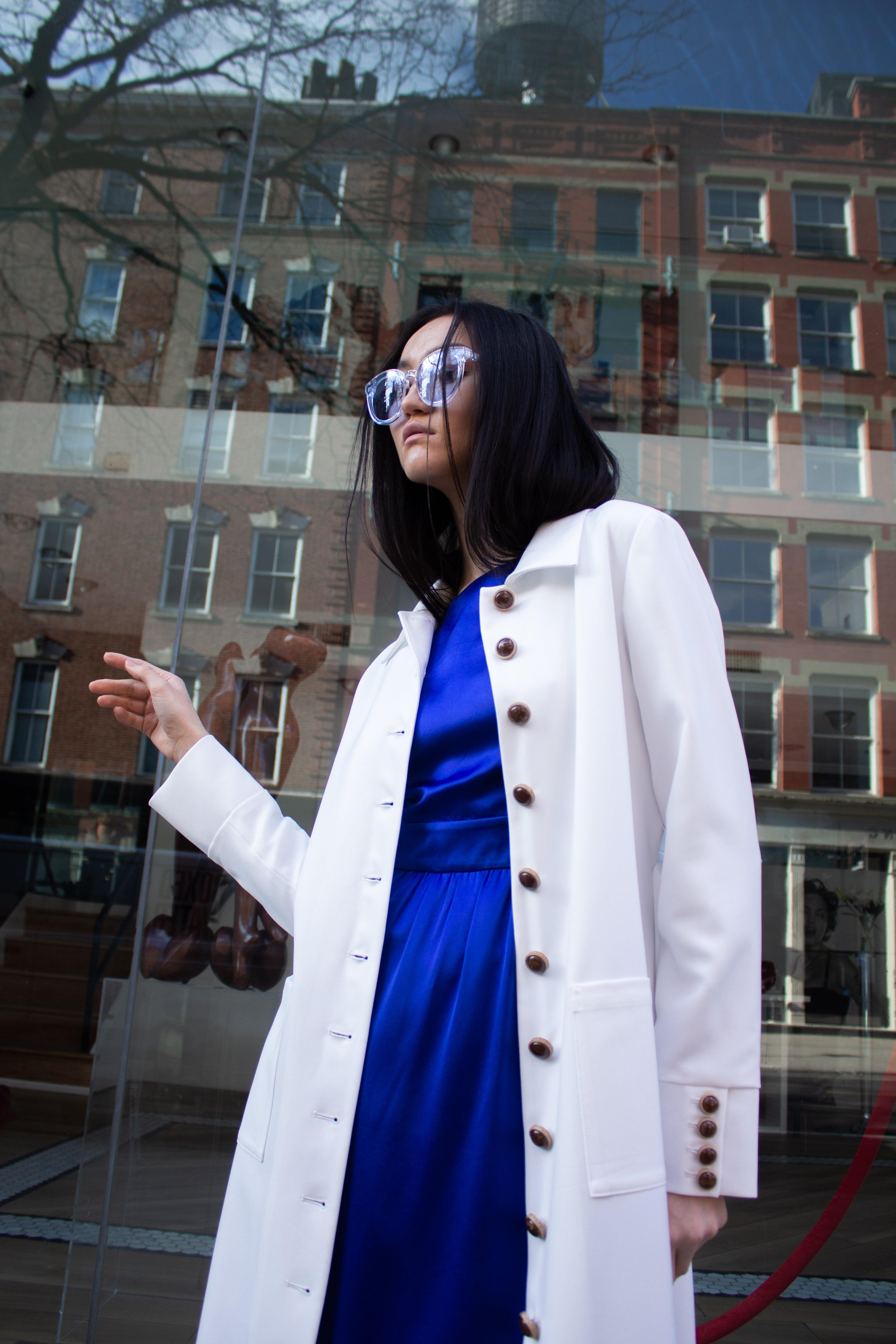 Le Réussi® Fashion - Monique White Coat an epitome of luxury and grace, tailored for timeless sophistication.