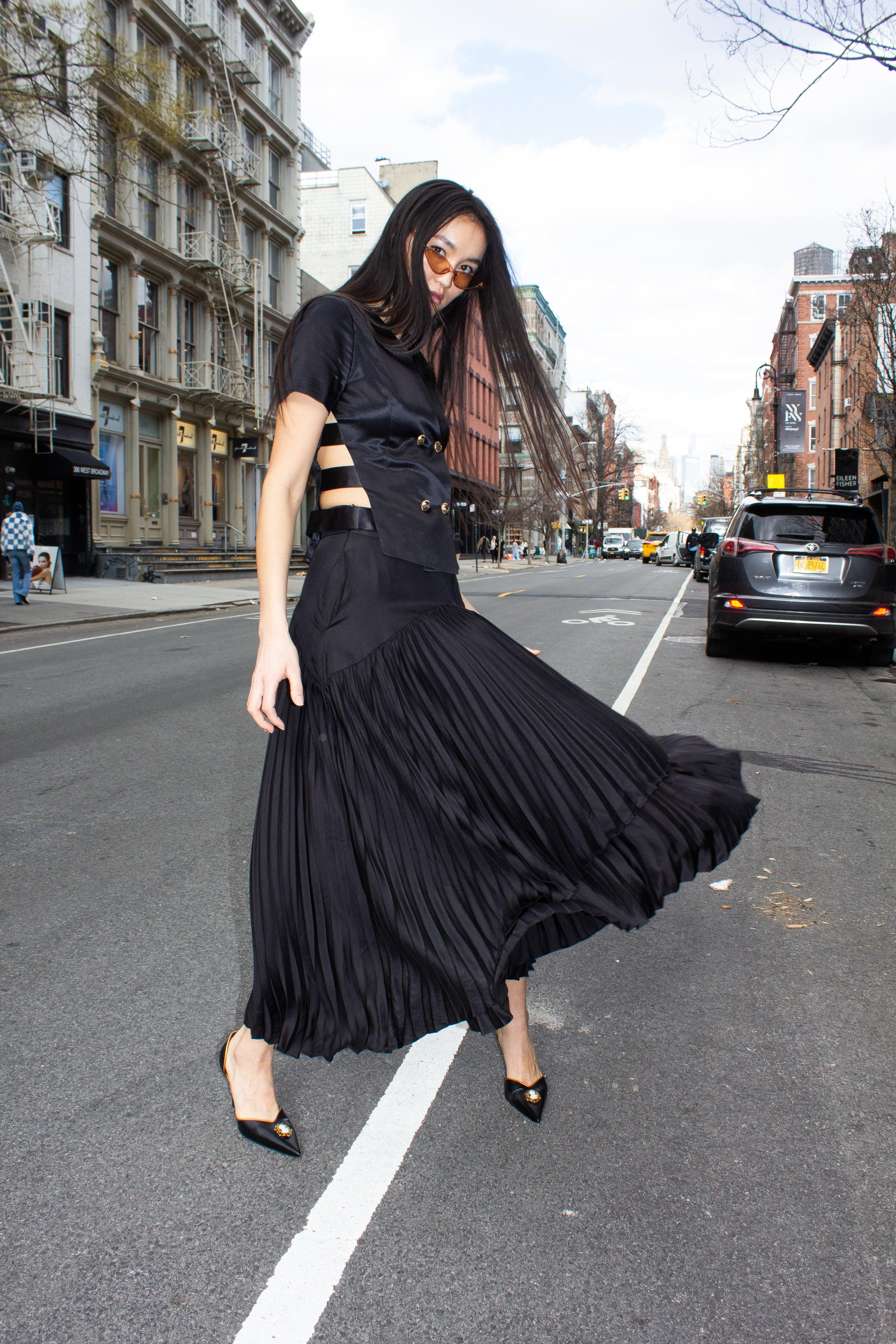 Le Réussi® Fashion - Maryanne Black Pleated Skirt where timeless elegance meets effortless movement in a luxe, sophisticated design.