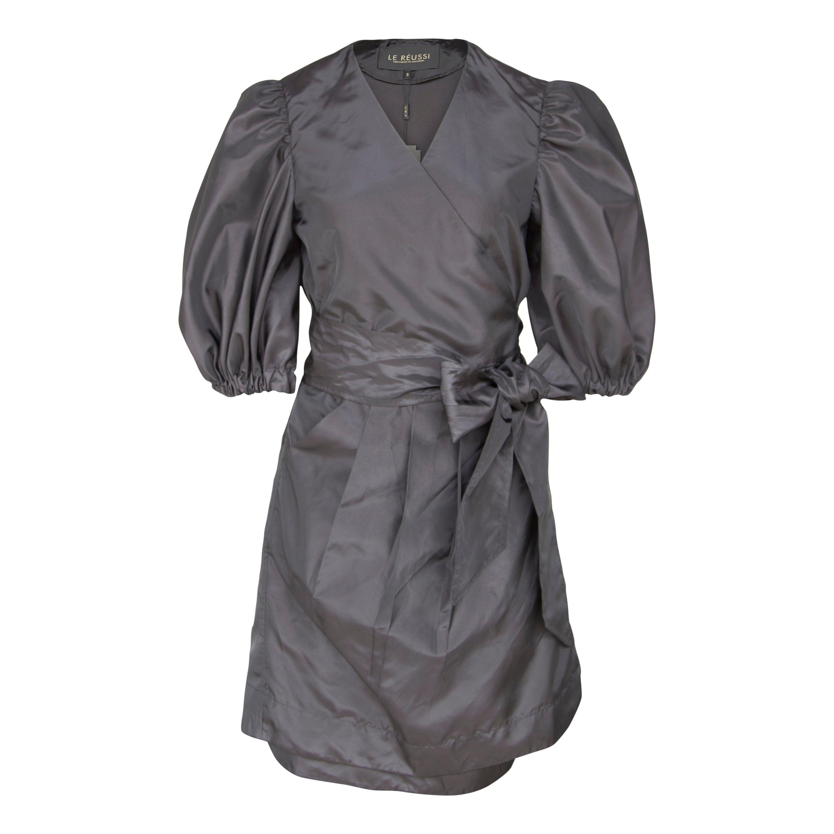 Le Réussi® Fashion - Black Lusso Wrap Dress pure luxury with timeless elegance.