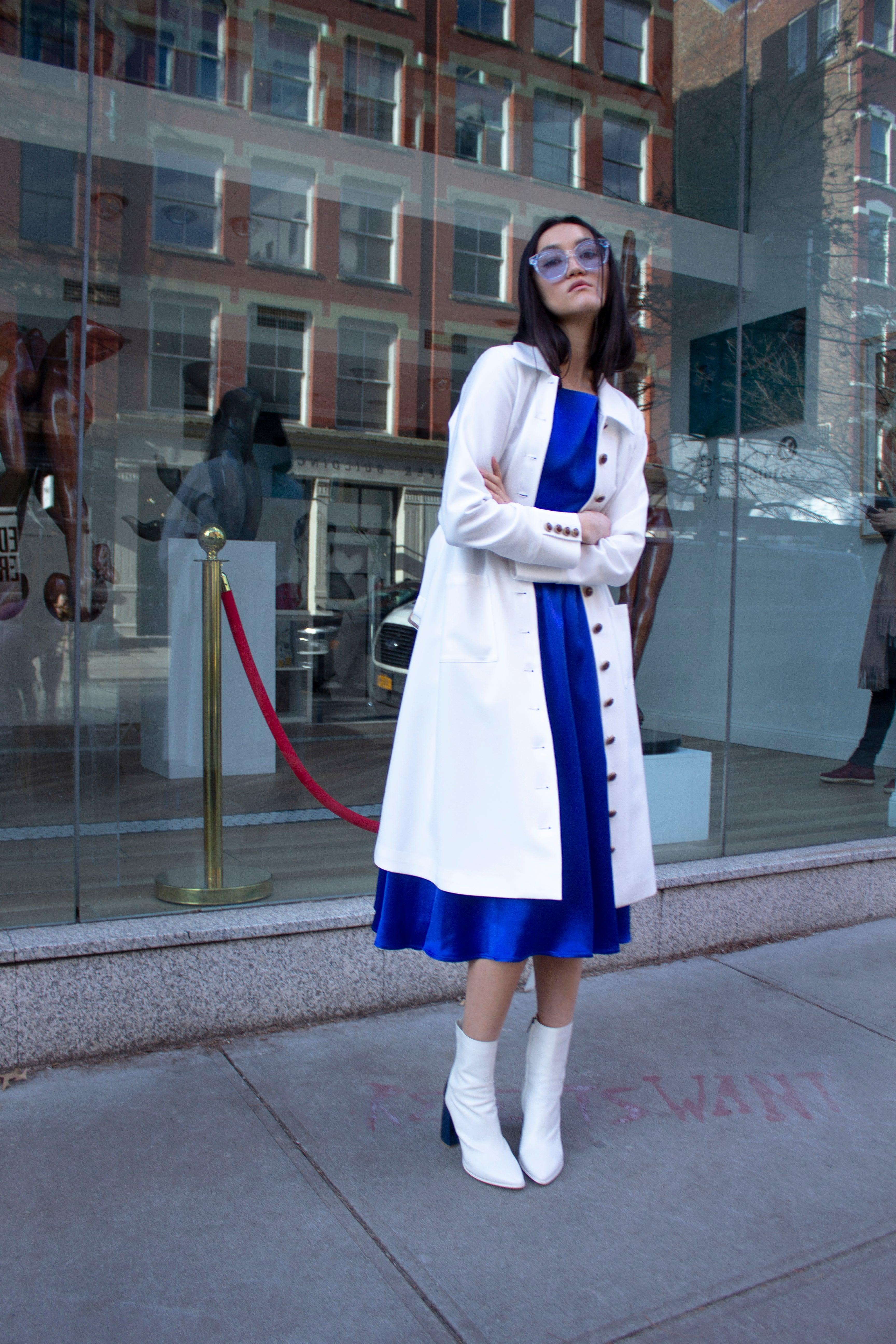 Le Réussi® Fashion - Monique White Coat an epitome of luxury and grace, tailored for timeless sophistication.